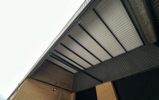 Wide angle of industrial canopy with pigeon exclusion netting system